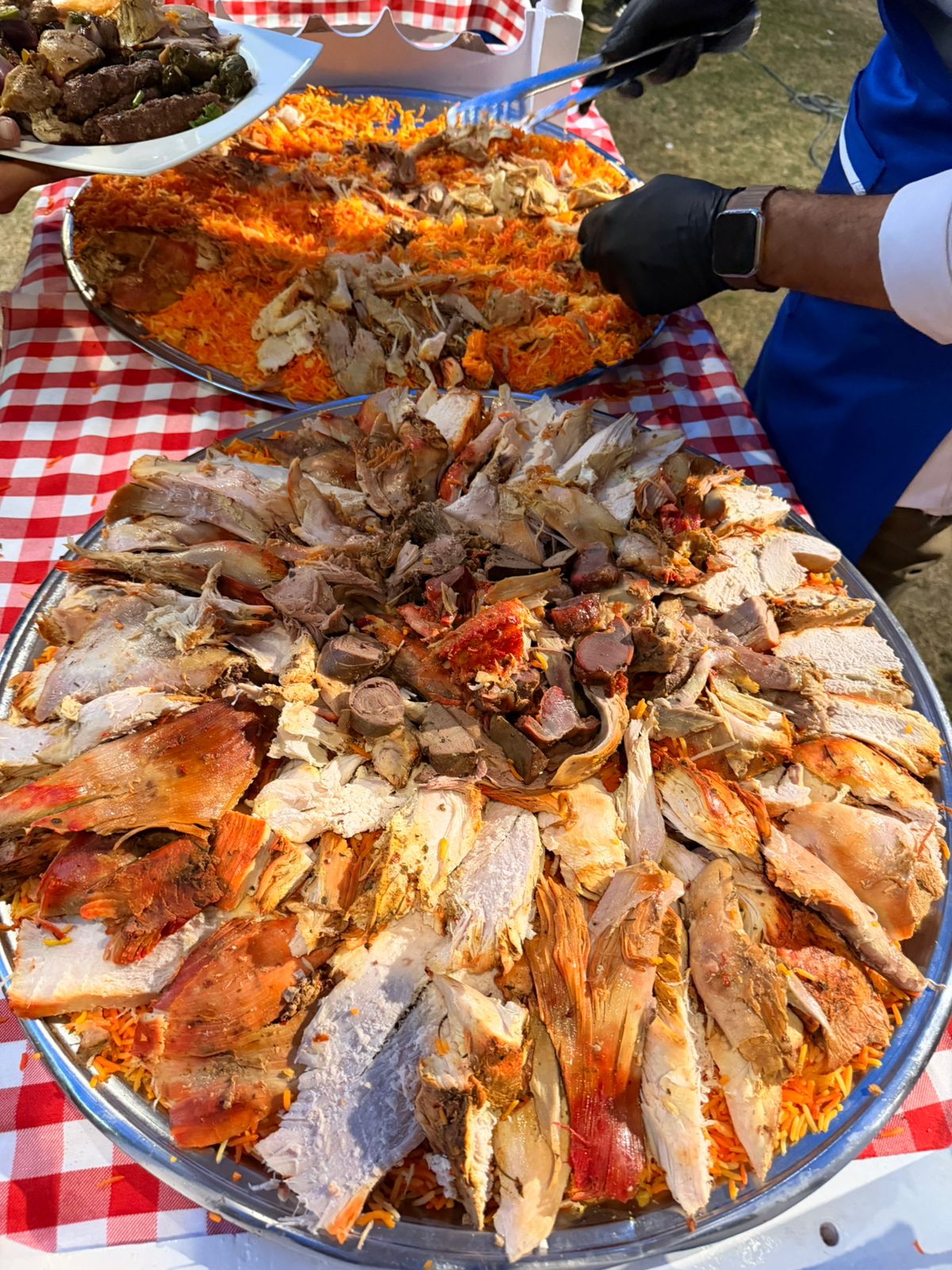 A chef preparing a colourful catered meal 3